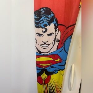 New sexy Superman workout pants leggings.  Great graphics on both sides.  XS.